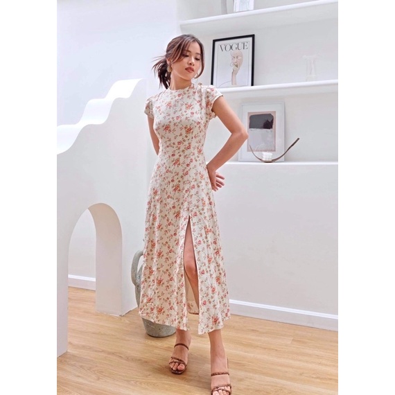 Đầm tay liền xẻ tà hở eo sau