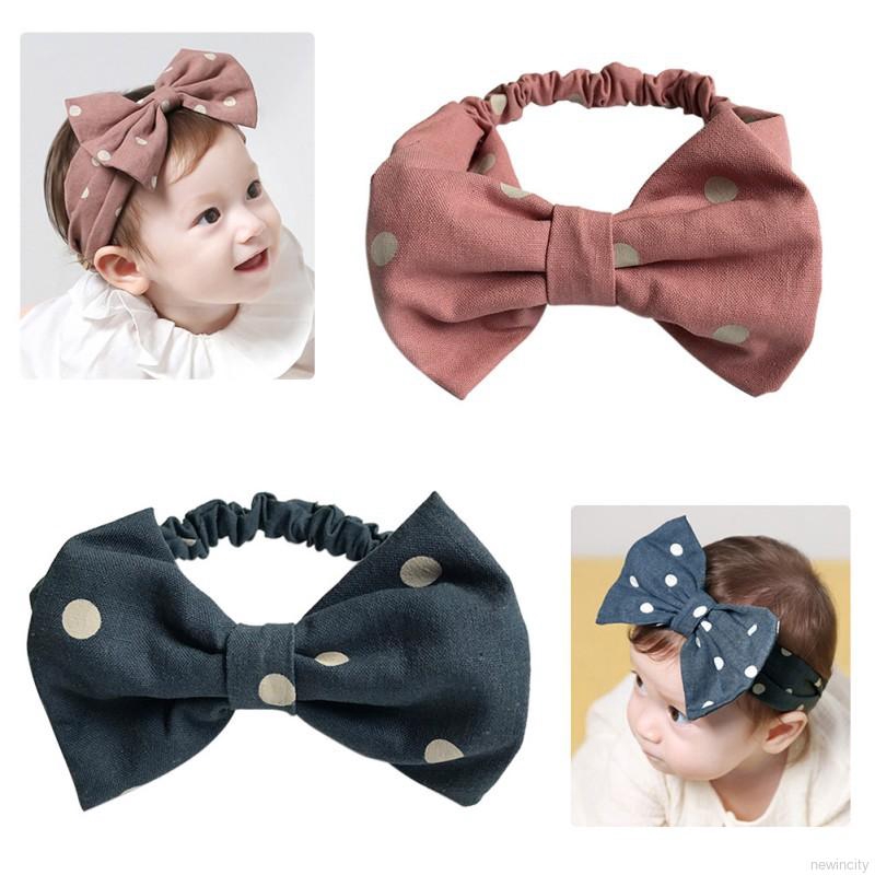 Băng đô nơ chấm bi đáng yêu cho bé