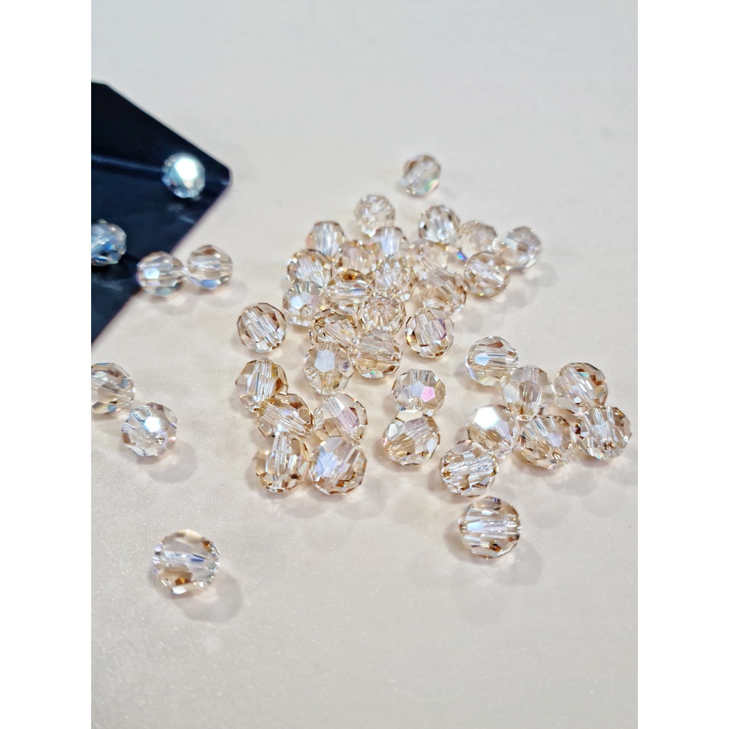 ĐÁ PHA LÊ SWAROVSKI TRÒN GIÁC LỚN MÀU TRÀ 8MM