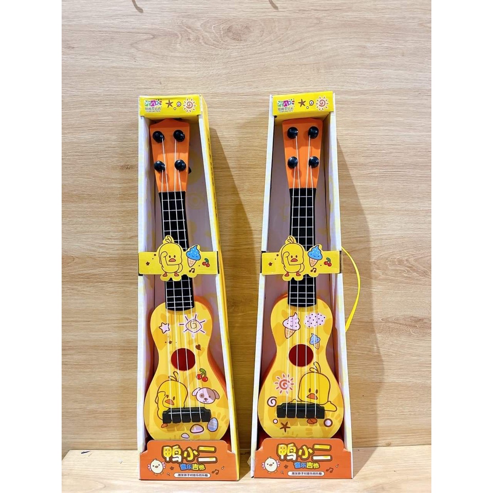 Đàn Ghita Ukelele mini đồ chơi dễ thương hình khủng long, Vịt vàng cho bé đồ trang trí chụp ảnh BHI KIDS