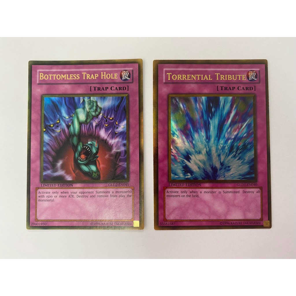 thẻ bài Yugioh! Torrential Tribute x Gold Rare Bottomless Trap Hole