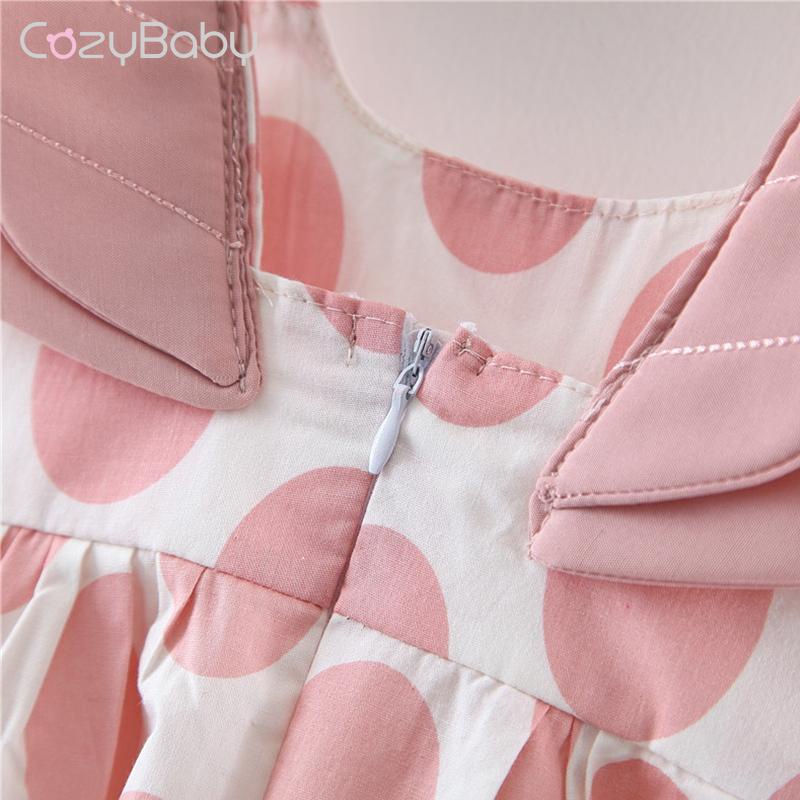 Đầm Sát Nách Chấm Bi Gắn Cánh 3D Và Nón Xinh Xắn Cho Bé Gái