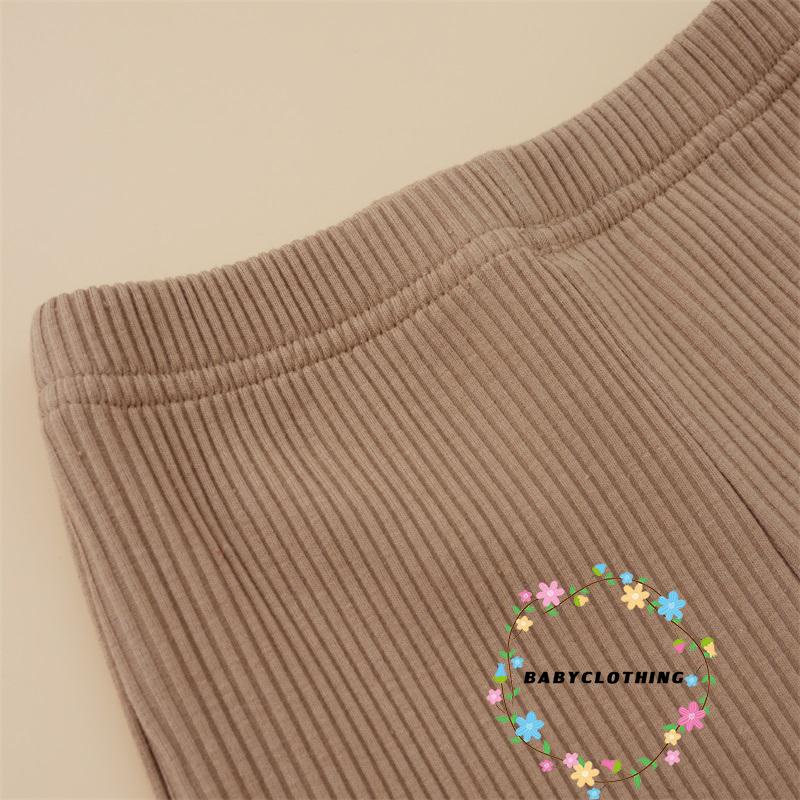 Bộ áo khoác dệt kim tay dài đính nút + quần dài lưng cao co giãn tốt thời trang cho bé