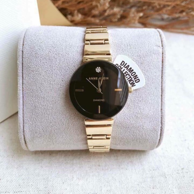 Đồng hồ nữ ANNE KLEIN model AK/2434BKGB tone vàng gold mặt đen sang trọng