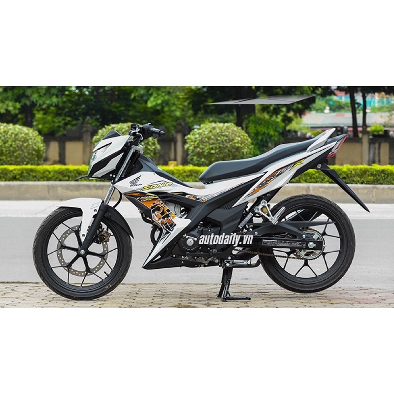 ( Quí khách vui lòng mang ra tiệm cho thợ dán ) sonic trắng cam