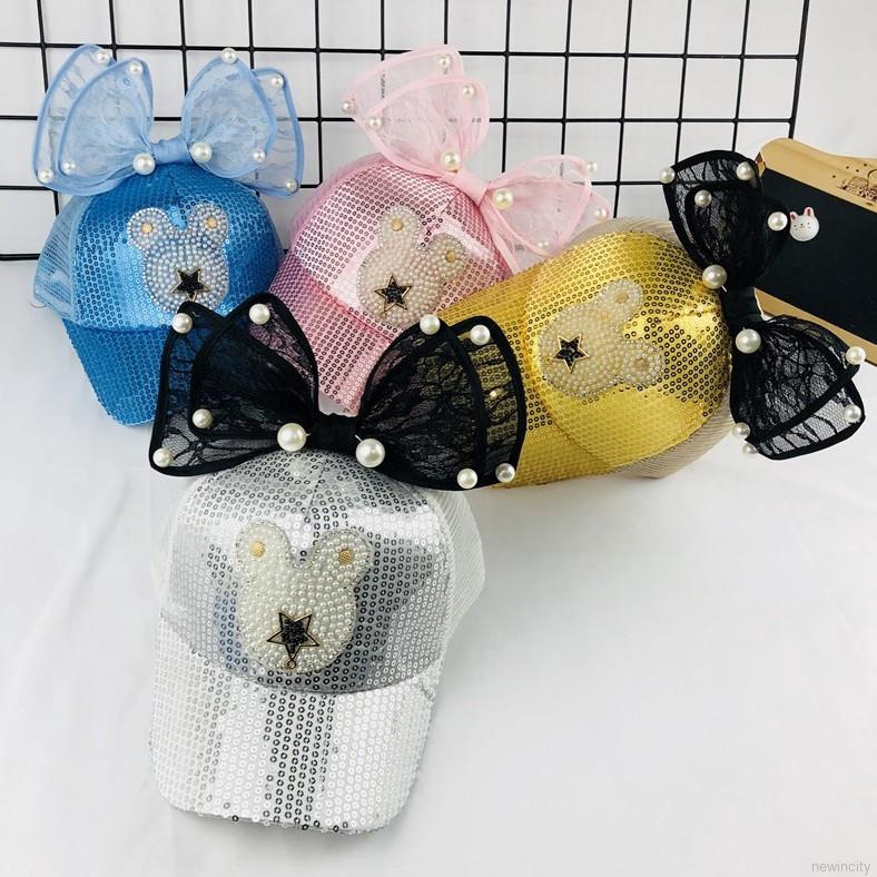 Mũ lưỡi trai đính nơ và họa tiết ngôi sao lấp lánh cho bé