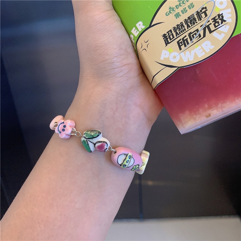 Vòng tay AY chuỗi hạt gốm màu cầu vồng mặt hình hoa mặt cười hoạt hình dễ thương