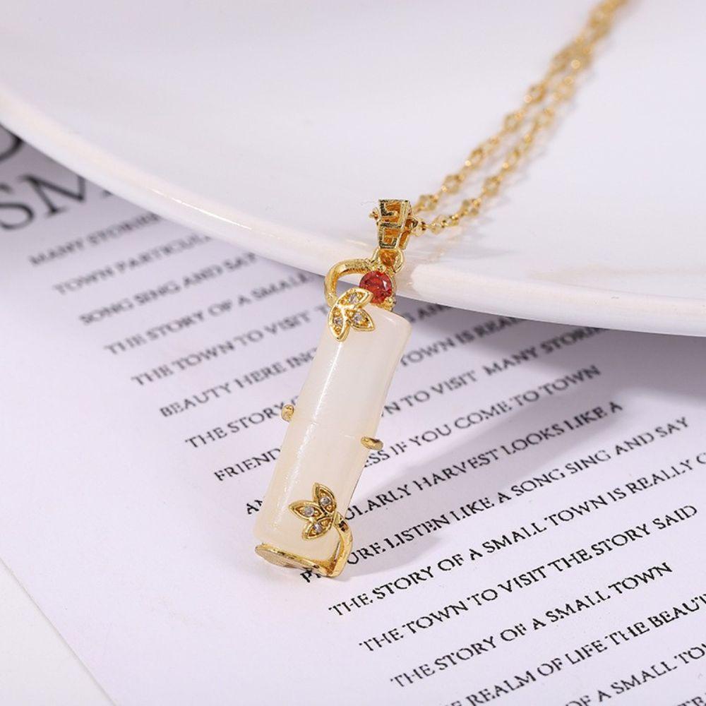 Vòng cổ Thép Titan Mặt Hình Mắt Mèo Thắt Nút Tre Sang Trọng Cho Nữ