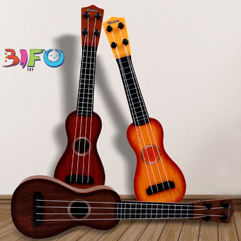 Đàn guitar mini giúp bé phát triển tài năng âm nhạc
