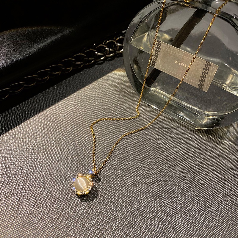 Vòng cổ Thép Titan Mặt Đá Opal Tròn Xoay Được Thanh Lịch