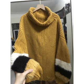 Áo len vàng tay lông dáng thụng hàn xẻng siu xinh