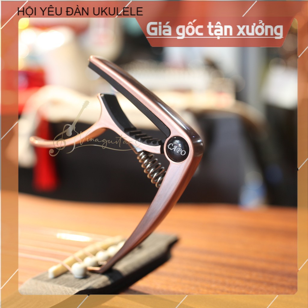 Capo Kim Loại Đàn Guitar Acoustic M9Z- Có Chốt Nhổ Dây