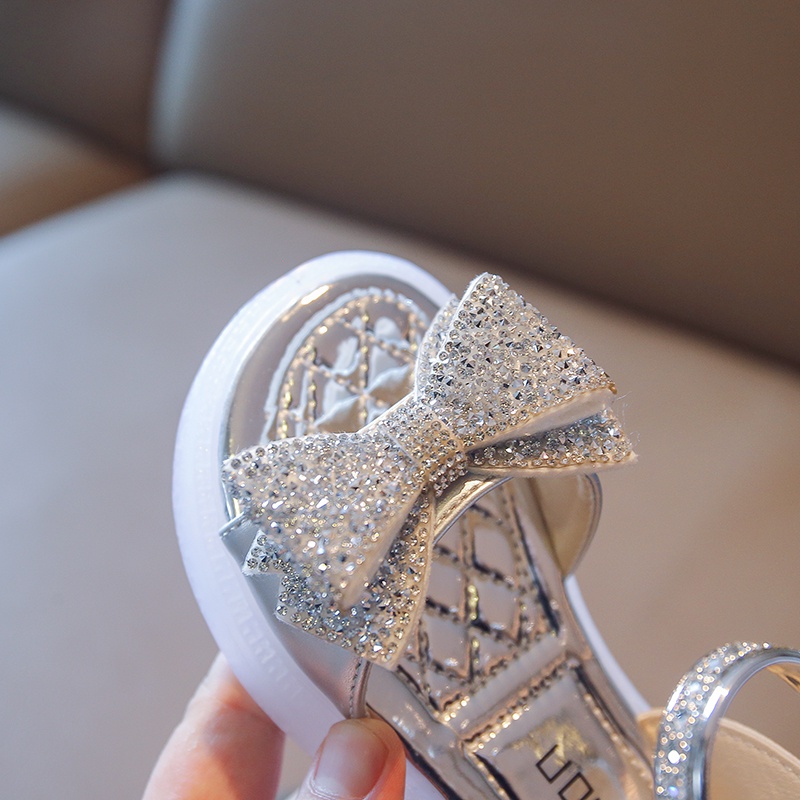 Xăng đan Da Bóng Đế Mềm Chống Trượt Đính Đá Phối Nơ Xinh Xắn Dành Cho Bé Gái 2-18 Tuổi