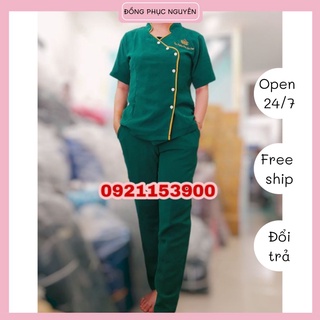Đồng phục spa màu xanh lá viền vàng