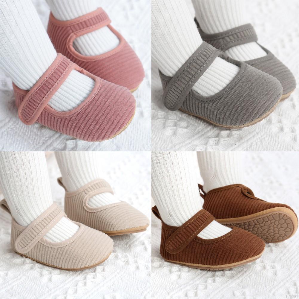 Đôi giày cotton chống trượt mềm mại kèm vớ cho bé gái mới biết đi