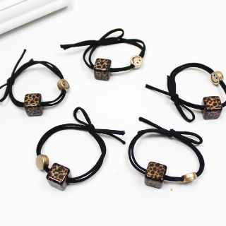 Dây buộc tóc da báo mặt cười