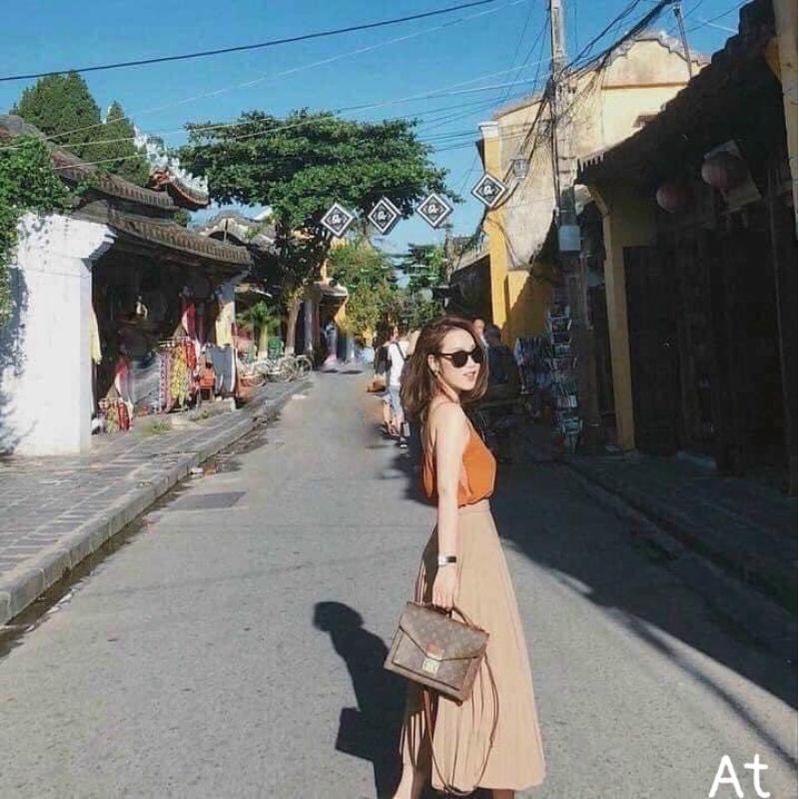 CHÂN VÁY MIDI BE KHUY GỖ