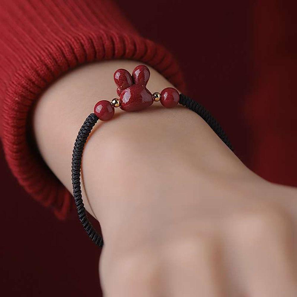 Vòng Tay Dây Bện Phối Mặt Hình Thỏ Hoàng Đạo Trung Hoa Thanh Lịch Cho Nữ