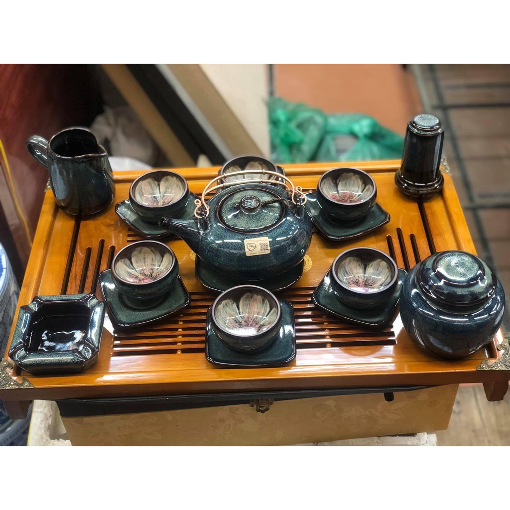 Bộ ấm chén , bộ tách trà hoả biến hoa nở trong lòng chén hàng nghệ nhân cao cấp