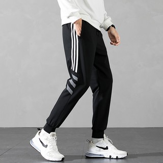 Quần Jogger Nam bo gấu phối sọc phong cách thể thao, chất liệu Polysiter dày đẹp