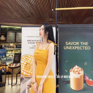 Đầm những 2 dây cột nơ vai