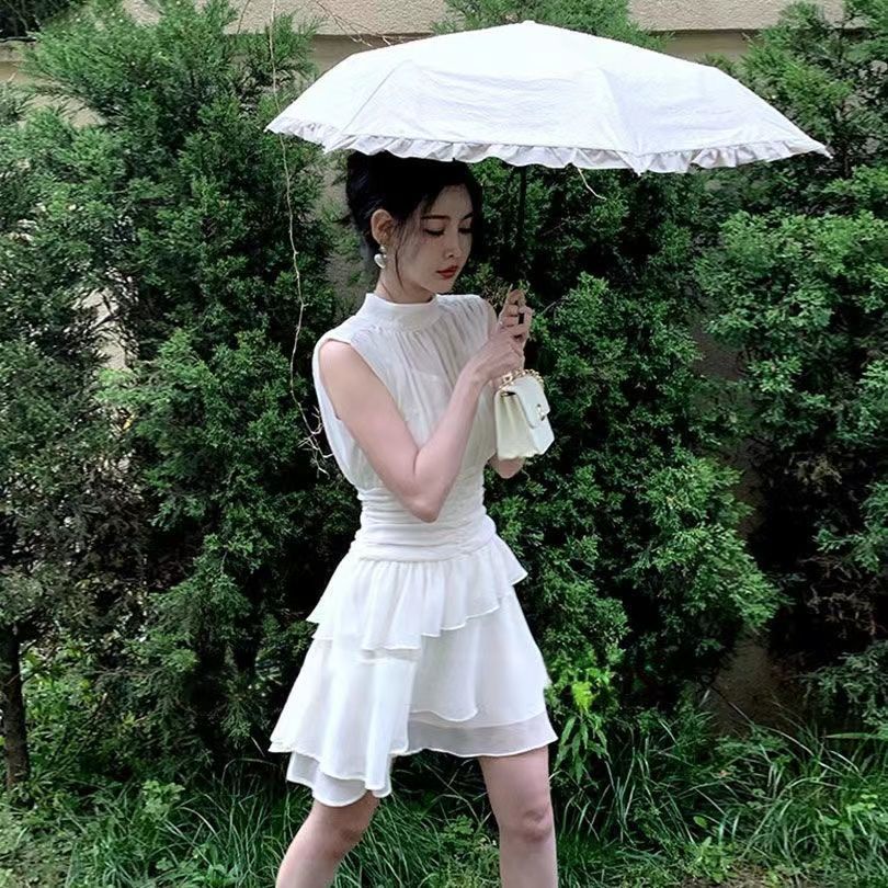 Sleeveless irregular white dress women's dress 2022 summer new first love department stand collar design sense minority skirt