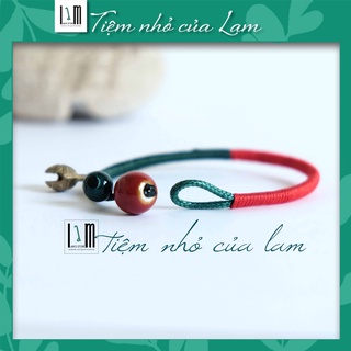 Vòng tay hạt gốm có chuông dành cho cả nam và nữ