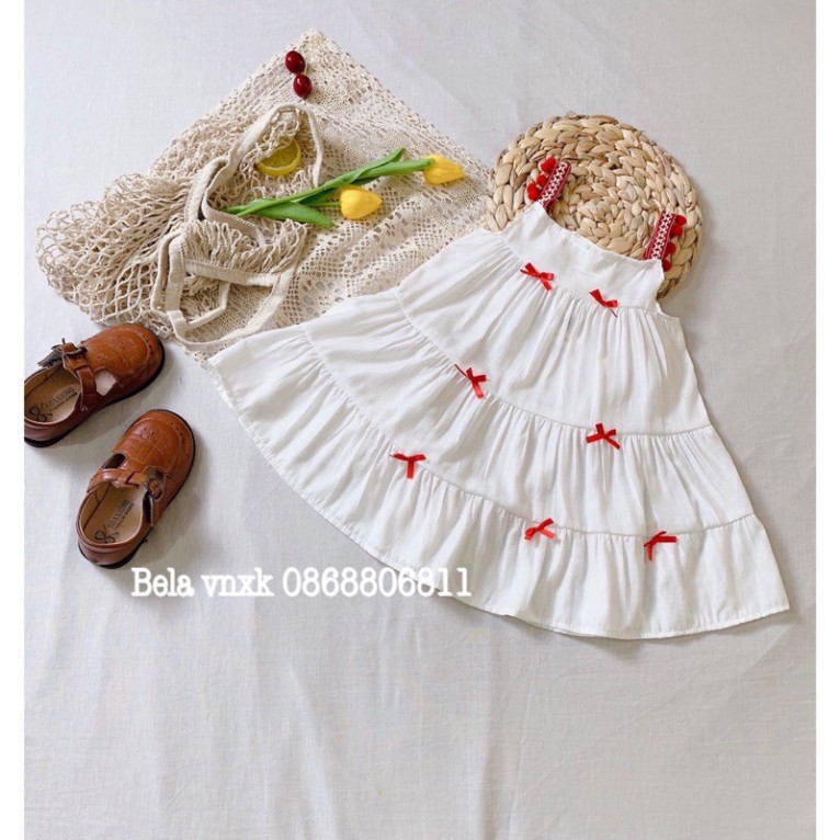 Váy Bé Gái Váy Hè 2 Dây Đi Biển Màu Trắng Đính Nơ Size 7-23kg