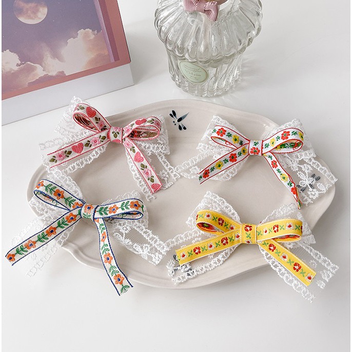 Kẹp nơ ren trắng họa tiết cổ điển KEP06