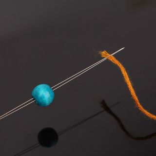 Kim xỏ cườm ( đính cườm )