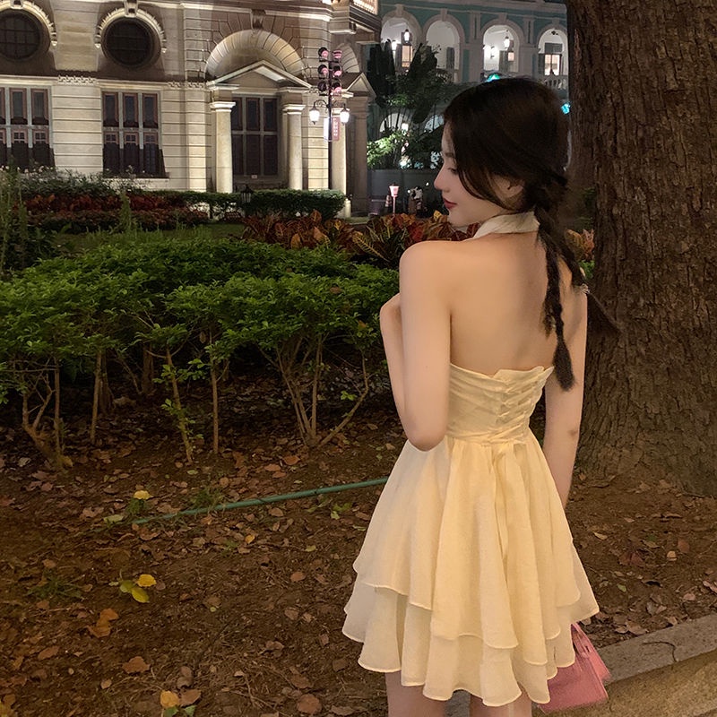 Đầm Ngắn Hai Dây Hở Lưng Đính Nơ Gợi Cảm Thời Trang Mùa Hè Hàng Mới Dành Cho Bạn Nữ