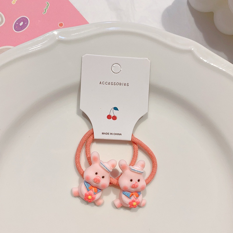 Dây thun cột tóc gắn hình chú heo hồng đáng yêu cho bé gái