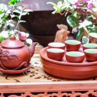 Ấm chén tử sa khay thủng đắp nổi
