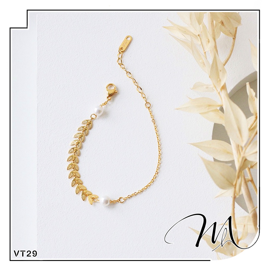 Lắc tay nữ Titan hình lá nguyệt quế ngọc trai nhân tạo Titan không gỉ - Măng's House VT29