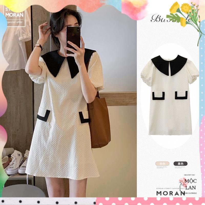 Váy MORAN cộc tay cổ bẻ rộng cánh sen phối màu đen trắng dáng A-line viền túi sang trọng Korea