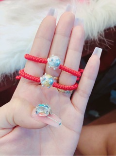 Lắc tay handmade chỉ đỏ mix lợn bạc