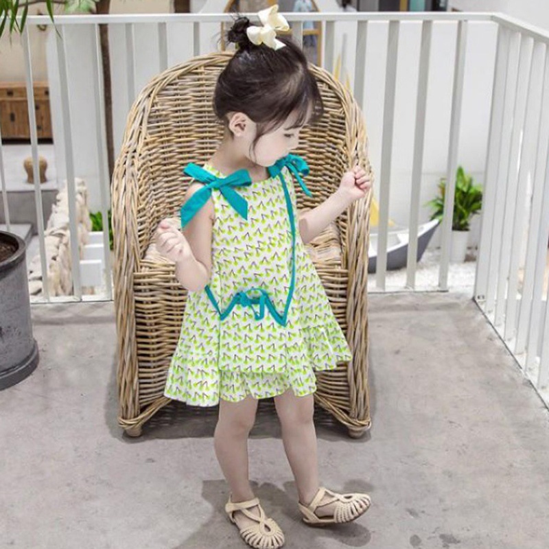 Đầm Công Chúa Hai Dây Đính Nơ In Hoa Se7en Cho Bé Gái