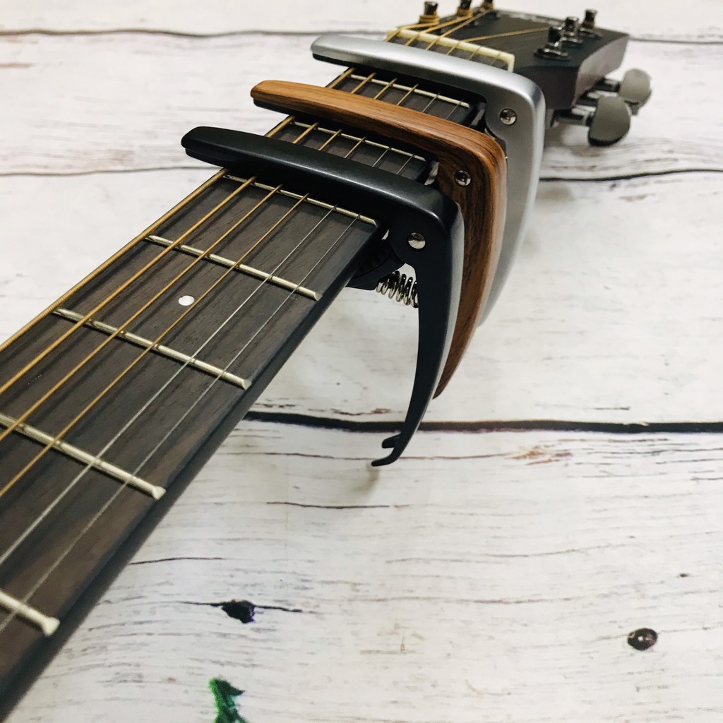 Capo guitar acoustic, ukulele, bass JX05 (Kẹp chắc chắn, có đầu nhổ chốt tiện lợi)