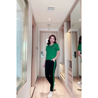 Set thể thao nữ xanh lá áo ngắn tay và quần legging bo gấu