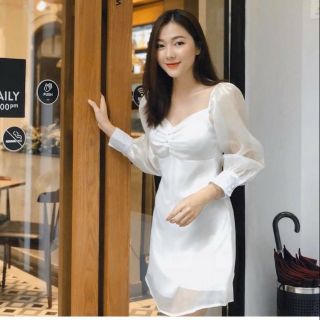 Đầm trắng nút bọc phối tay voan phồng