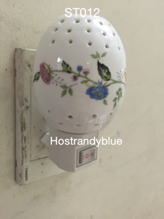 Đèn ngủ xông tinh dầu