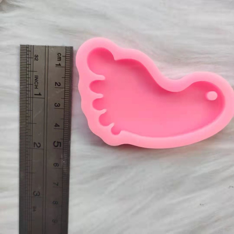Khuôn Silicone Làm Móc Khóa Hình Dấu Chân Em Bé Màu Hồng / Xanh Dương Lấp Lánh