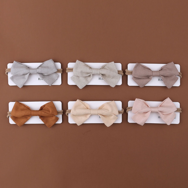 Băng Đô Cài Tóc Bằng Vải Lanh Co Giãn Trang Trí Thắt Nút Cho Bé Sơ Sinh