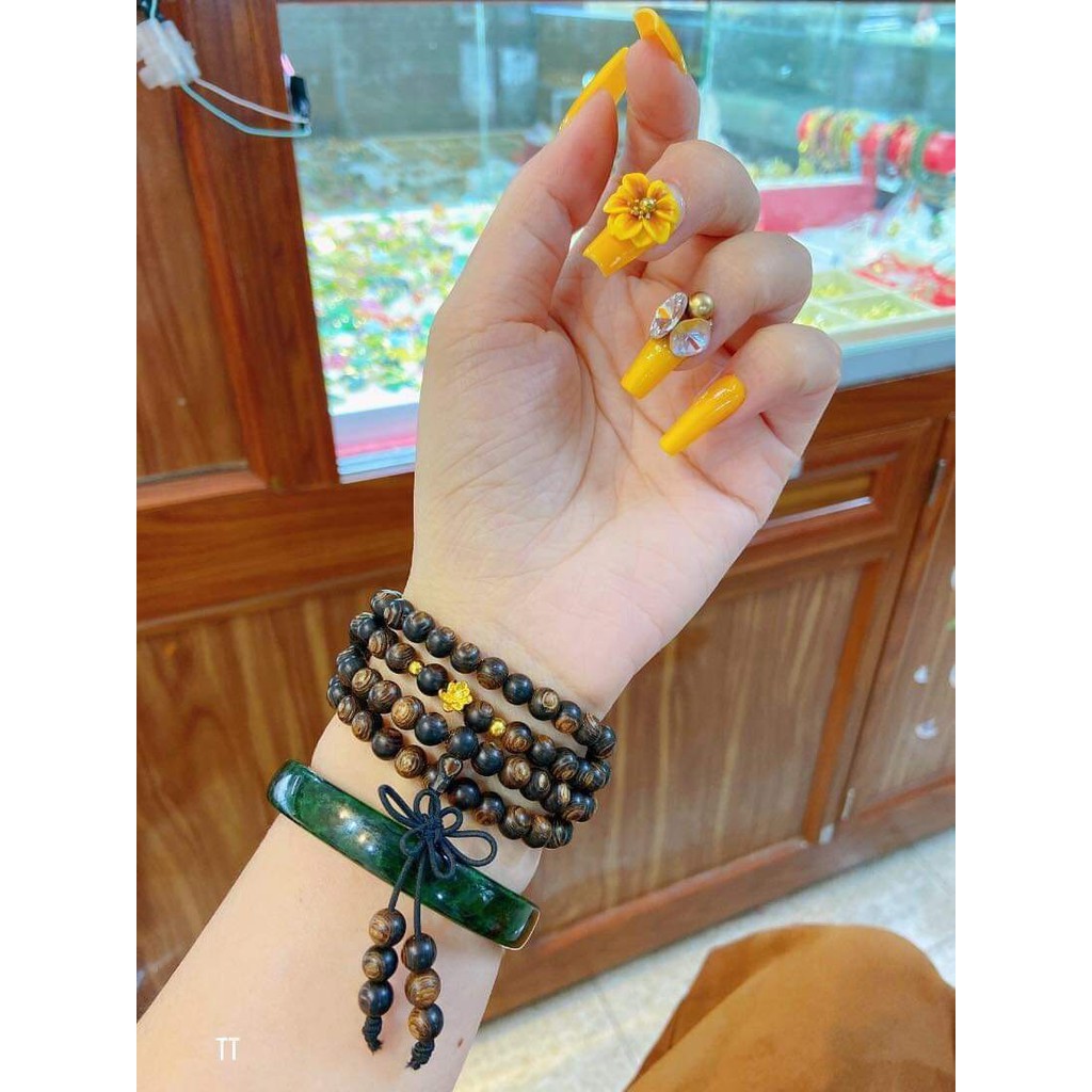 Vòng trầm sánh chìm vàng charm 24k