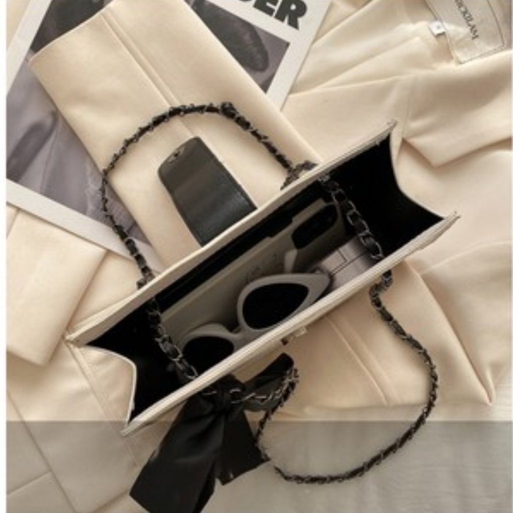 Túi xách nữ mã M04, túi đeo chéo, đeo vai, cúc bấm, thắt nơ đen, hàng quảng châu, chất lượng da cao cấp, đen trắng