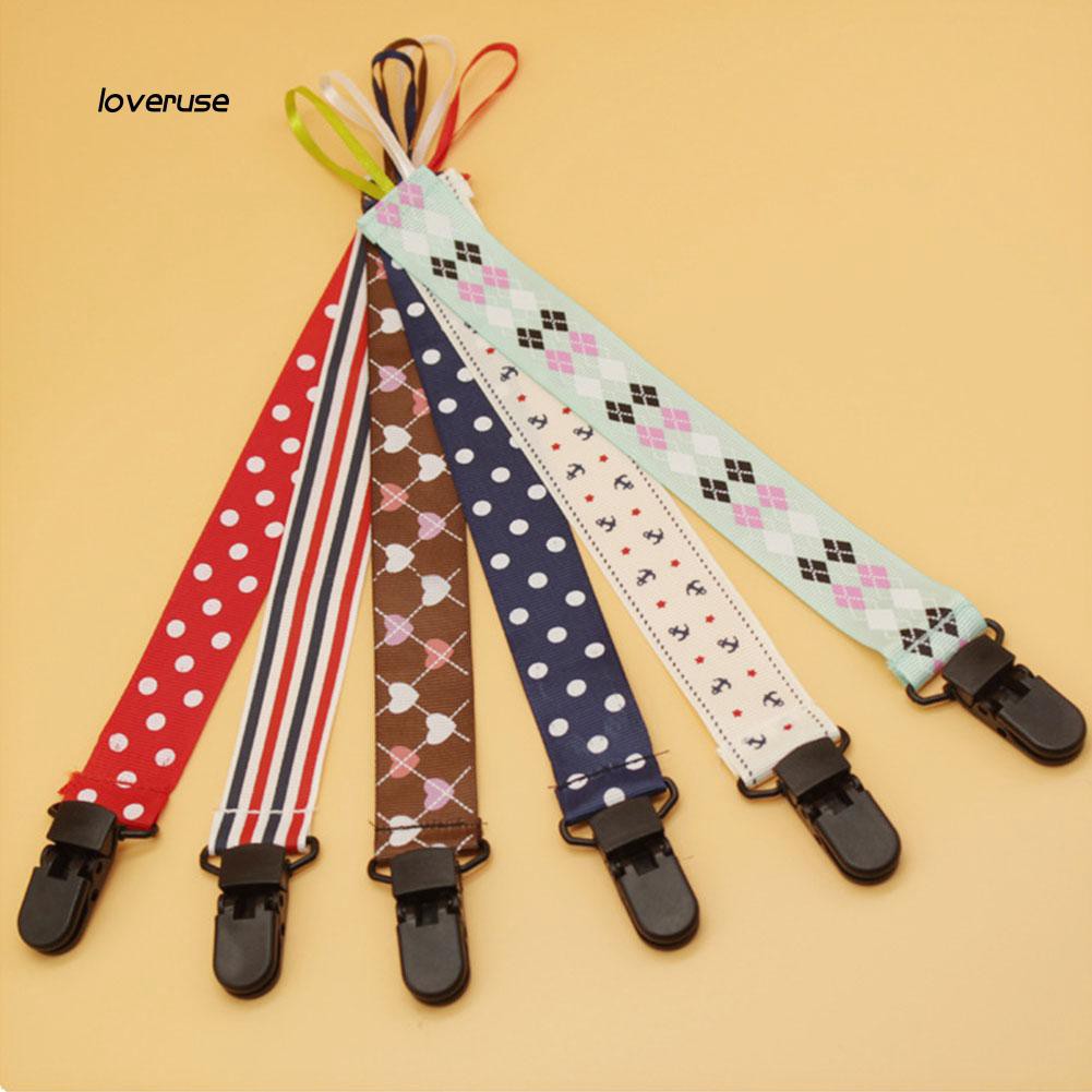 Dây giữ ti giả có kẹp gắn áo quần em bé siêu tiện lợi