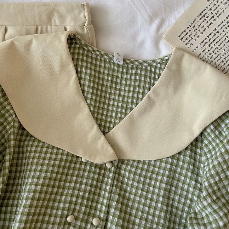 Set áo sơ mi kẻ caro xanh kèm chân váy dài - order