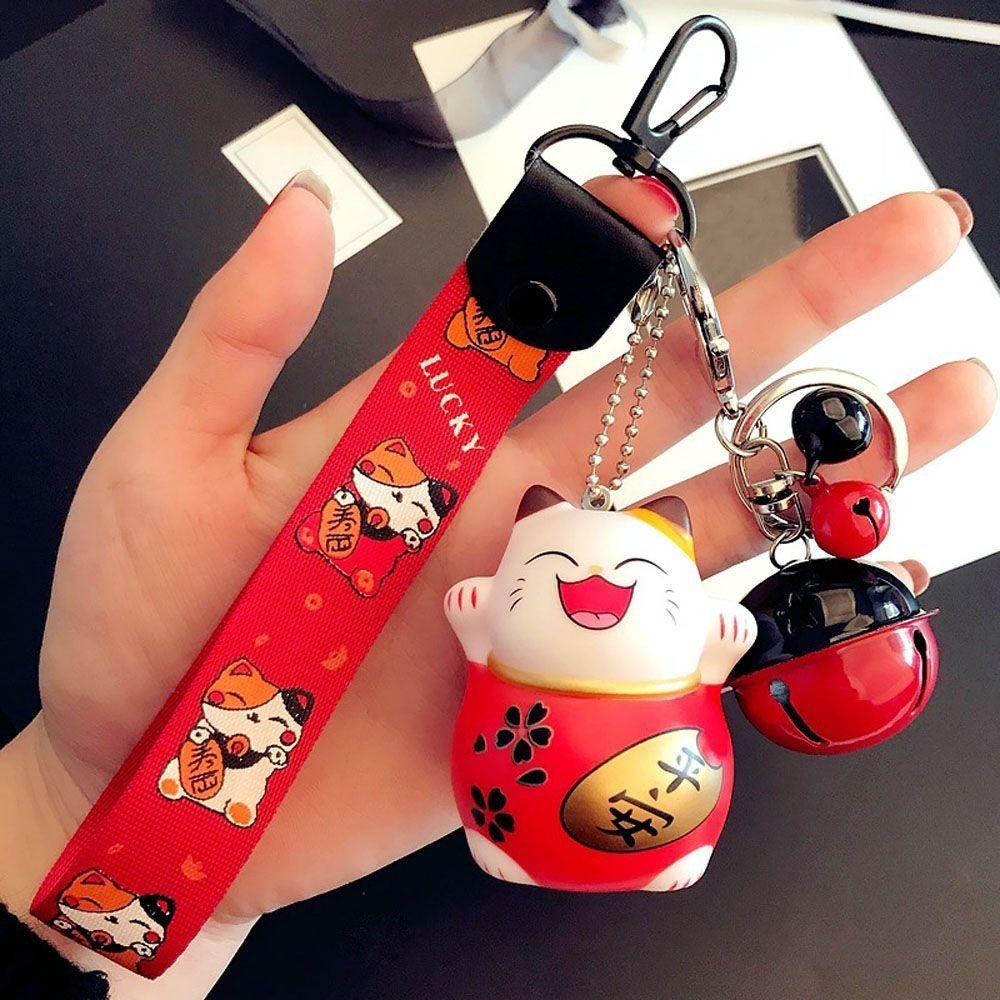 1 Móc Khóa Hình Mèo May Mắn Kèm Chuông Giá Đỡ Túi Xách