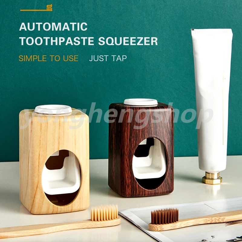 Giá Đỡ Lấy Kem Đánh Răng Tiện Dụng Sáng Tạo
