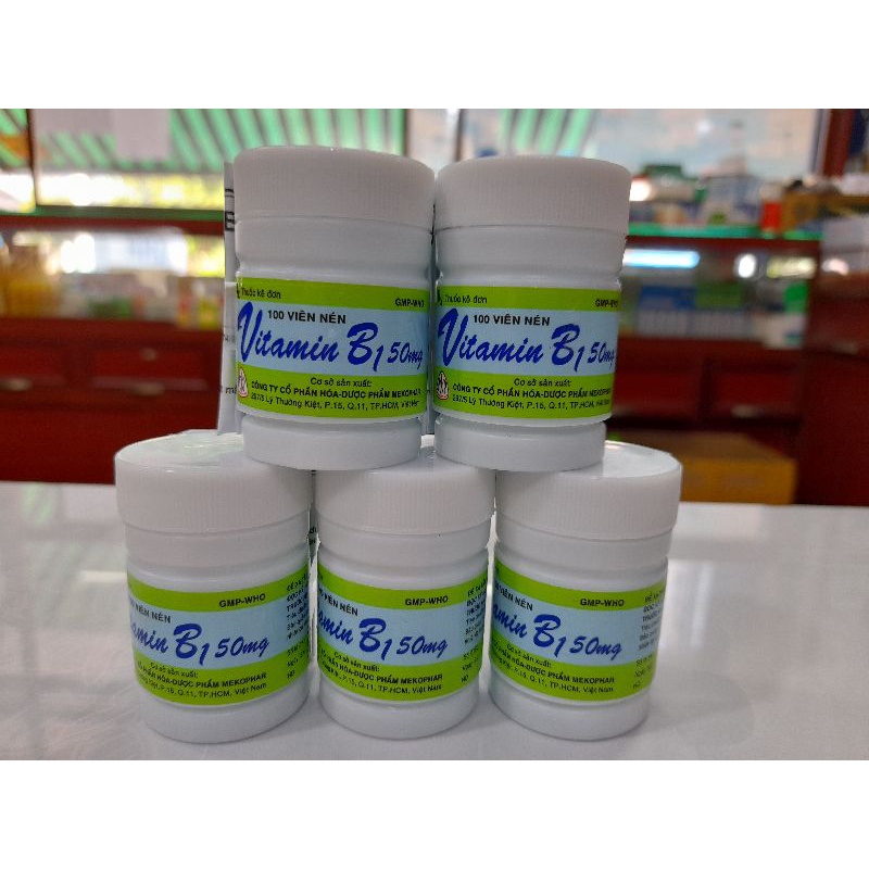 Vitamin B1.Lọ 100 viên màu xanh.Hộp 10 vỉ ×10 viên